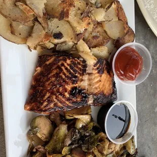 Salmon with home fries and Brussel sprouts