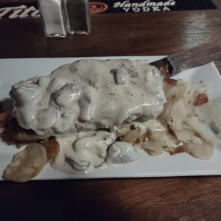 Strip steak with mushroom sauce