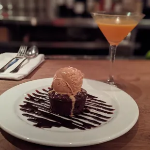 a dessert with ice cream and chocolate sauce