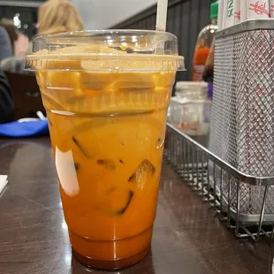 a plastic cup of iced tea