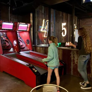 a woman and a child playing a game