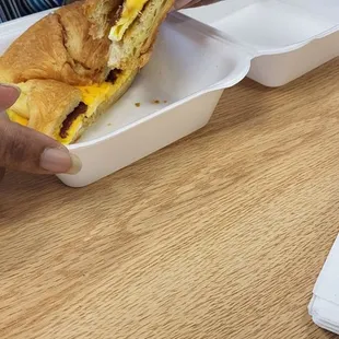 Sausage, egg, and cheese on a croissant.  Very delicious!