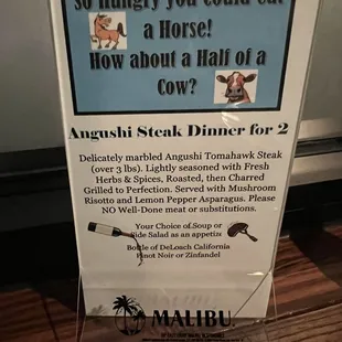 a sign for a steak dinner