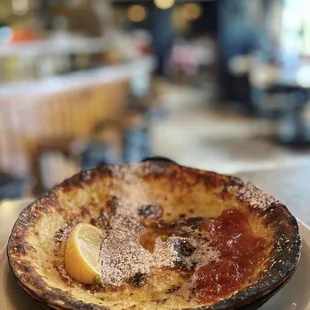 Dutch baby with peach preserves