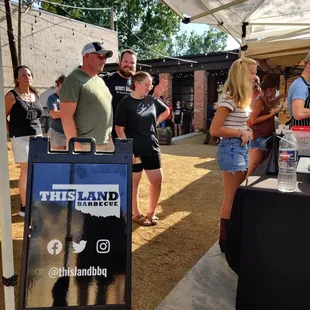 a group of people standing around