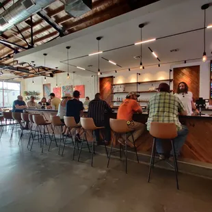 people sitting at the bar