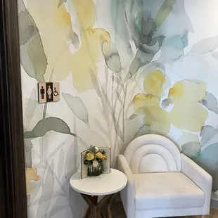 Seat outside the 2 unisex restrooms