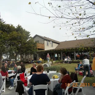 a crowd of people sitting at tables