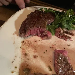 Part of the &quot;medium&quot; rib eye. You can see the butter on the bottom right.