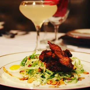 Crispy Duck Confit Salad Organic Frissee, Quial Egg adn Honey Roasted Almonds