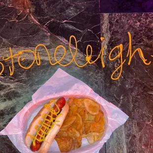 a hot dog and potato chips