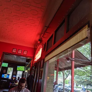 a man sitting at a table in a restaurant