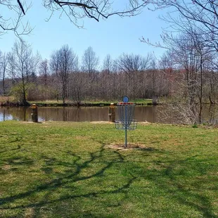 Frisbee golf hole 10. Frisbee must be trown across a part of the lake. Most frisbees we saw didn't make it across.