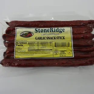 a close up of a pack of sausage