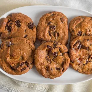 a plate of chocolate chip cookies