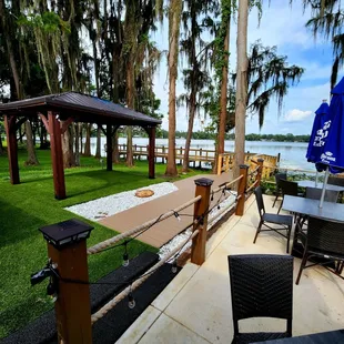 Aug 2022: Exterior Pic 2 of 10-- SEE the wooden walkway to the back dock