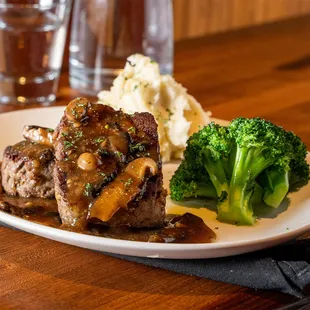 steak and broccoli on a plate