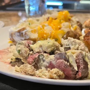 Steak and loaded baked potato