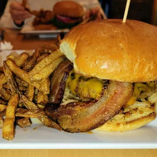 The Cowboy Burger.  Cheese, thick bacon, haystack onions, and BBQ sauce.