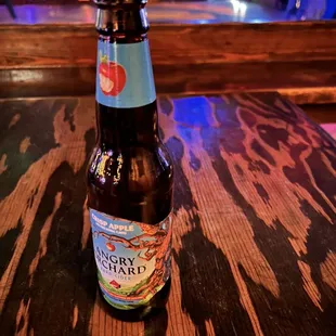  bottle of beer on a wooden table