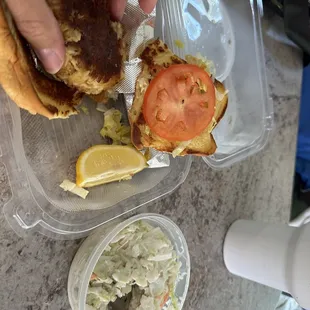 Very SMALL $42 crab cake sandwich with small serving of coleslaw.  Very good, but extremely overpriced.
