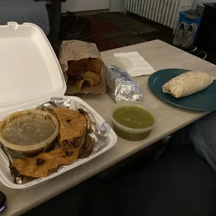 (Left to right) Birria Quesadilla, Chips and Salsa, Chicken Burrito, and Al Pastor Burrito