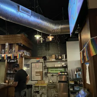 a man standing at the bar