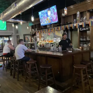 people sitting at the bar