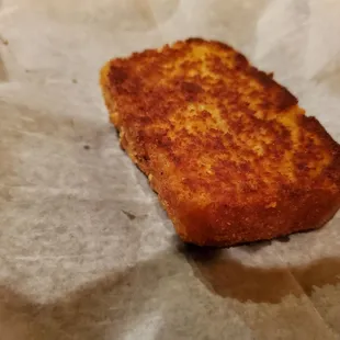 a piece of bread on wax paper