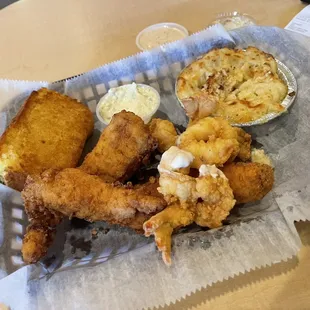 2 piece shrimp and cod with macaroni and cornbread.