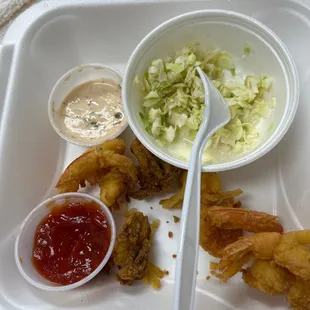 I had Shrimp and Oysters, with onions rings and coleslaw. And extra rice and beans . Yum