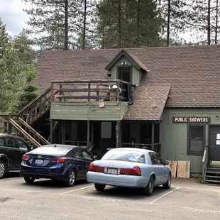 Weird broken down building next to lodge for public showers.