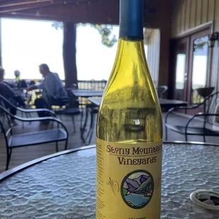 a bottle of wine on a table