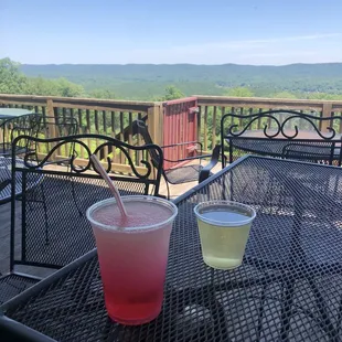 a table with two drinks on it