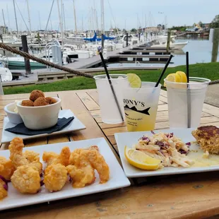 Dockside shrimp appetizer, hushpuppies, crab cake with coleslaw appetizer and a house margarita. Delicious!