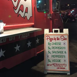 a sign for a pizza truck