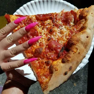 Her nails are more pink than the pepperoni is red. Or than the river is red. He said with a Stony face