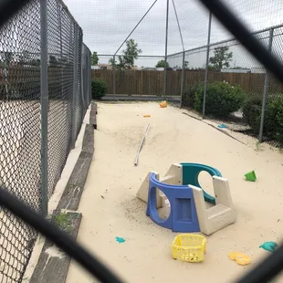  sand pit with plastic toys