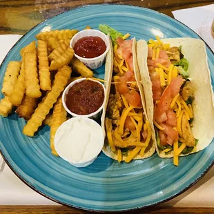 Chicken tacos and fries