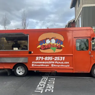 a food truck parked in a parking lot