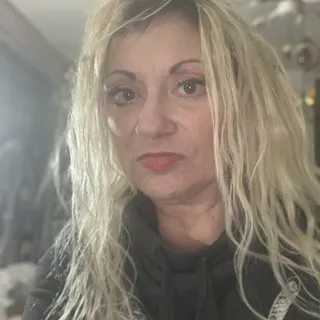 Xenia C.