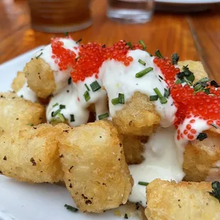 One of the "Off The Menu" apps for this evening: Tater Tots &amp; Caviar with a little apple purée underneath and crème fresh.