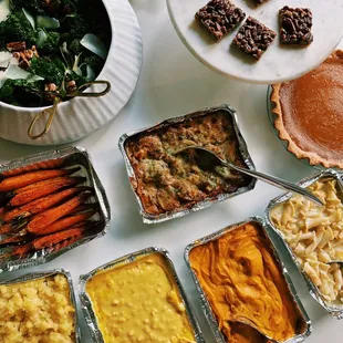 Roasted carrots, roasted galette, mashed potatoes, creamed corn, sweet potato, Mac n cheese.