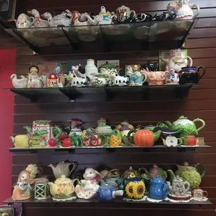 Some of the adorable teacup and tea kettle collection