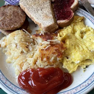 2 Eggs, Sausage, Toast with side of Hash Browns.