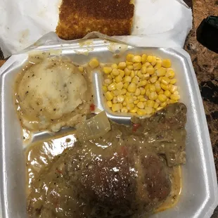 Smothered pork chops, mashed potatoes with corn and that famous sweet cornbread another favorite