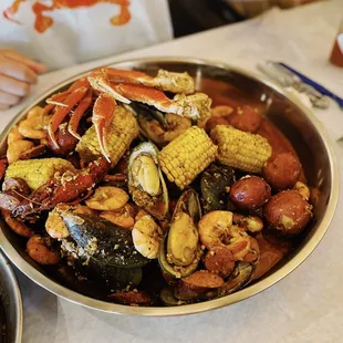 Snow Crab Legs, Corn, Sausage, Red Potatoes, Green Mussels, Headless Shrimp, Crawfish