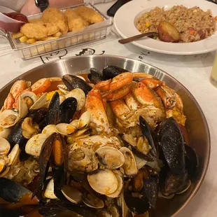 a bowl of clams and mussels