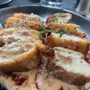 Zucchini rotini app special stuffed with prosciutto amen cheese - deliciousness