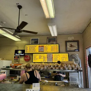 Menu board and prep shelves
